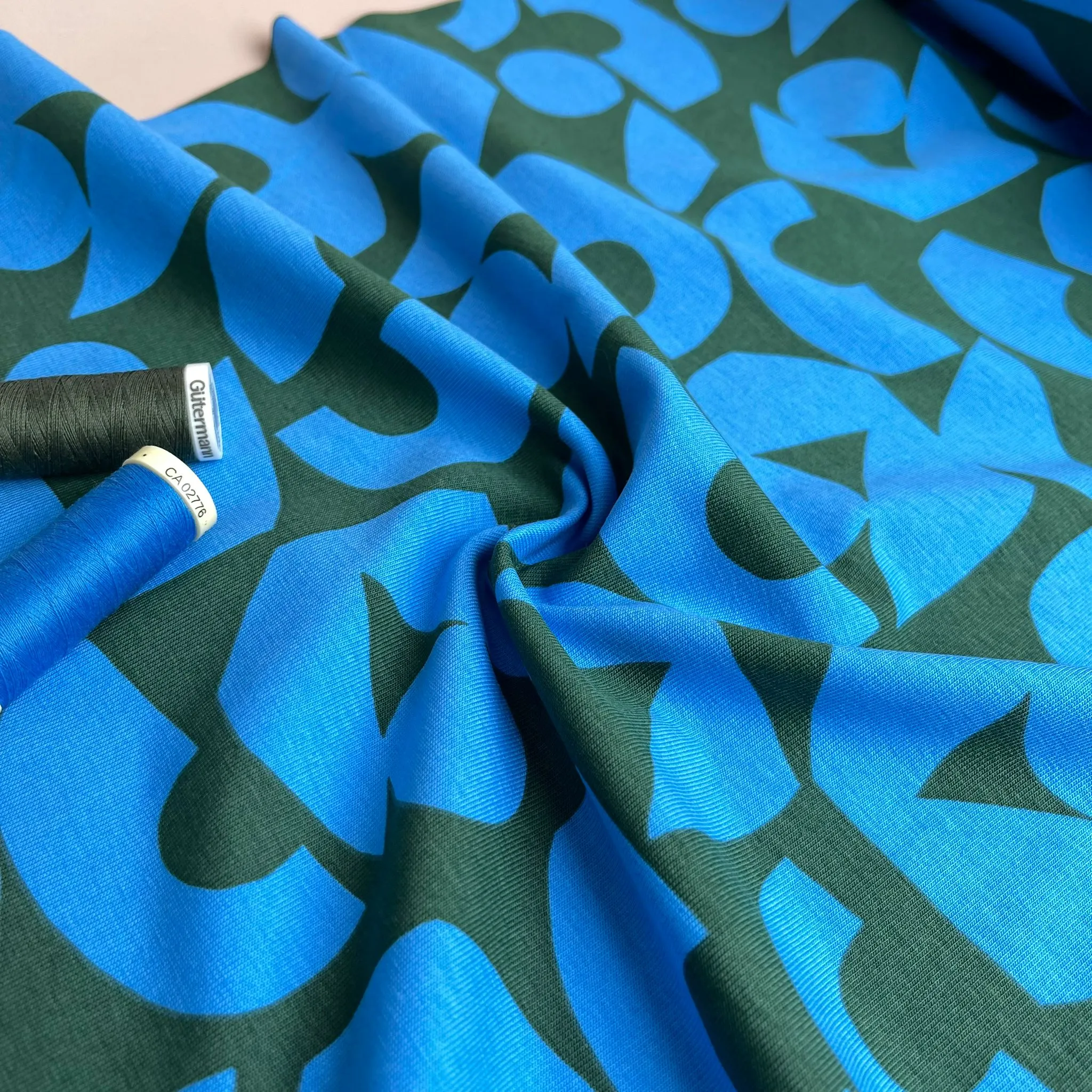 Blue Shapes on Khaki Combed Cotton Jersey Fabric