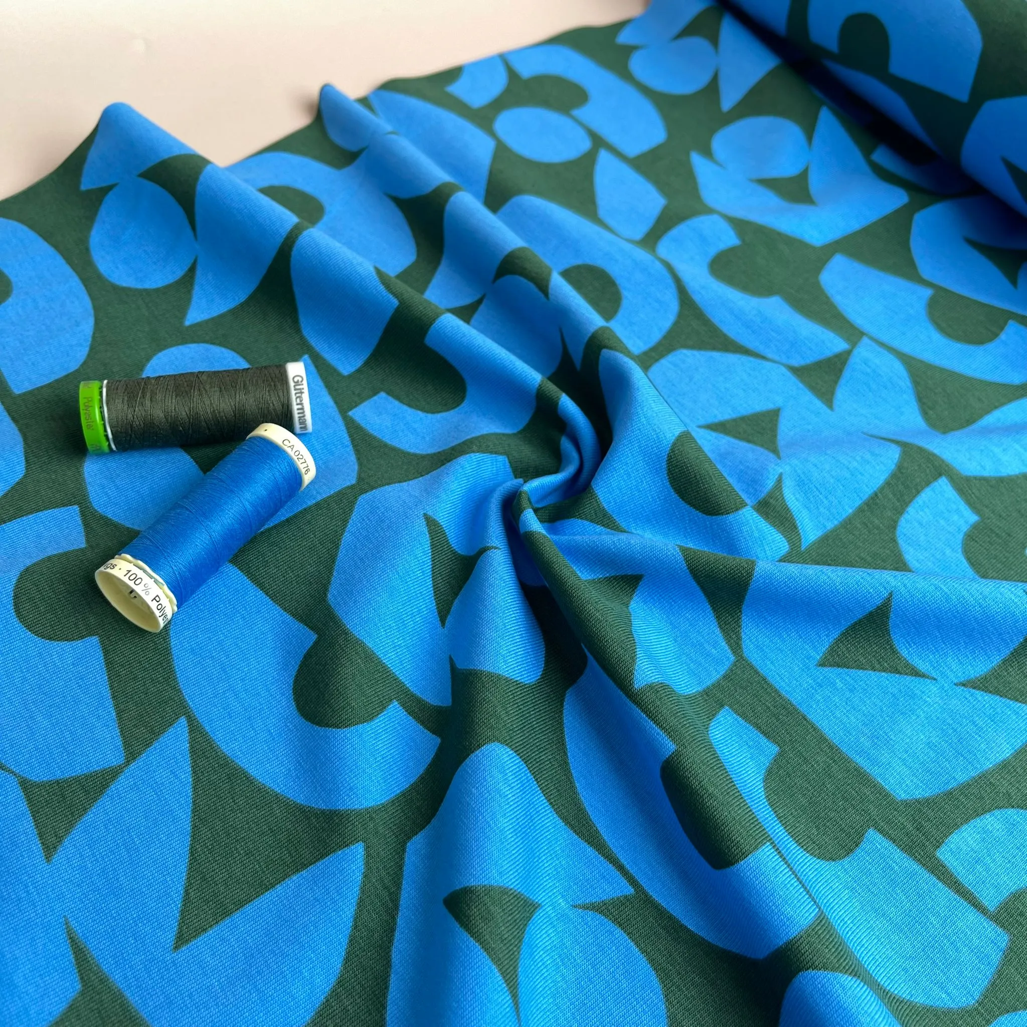 Blue Shapes on Khaki Combed Cotton Jersey Fabric