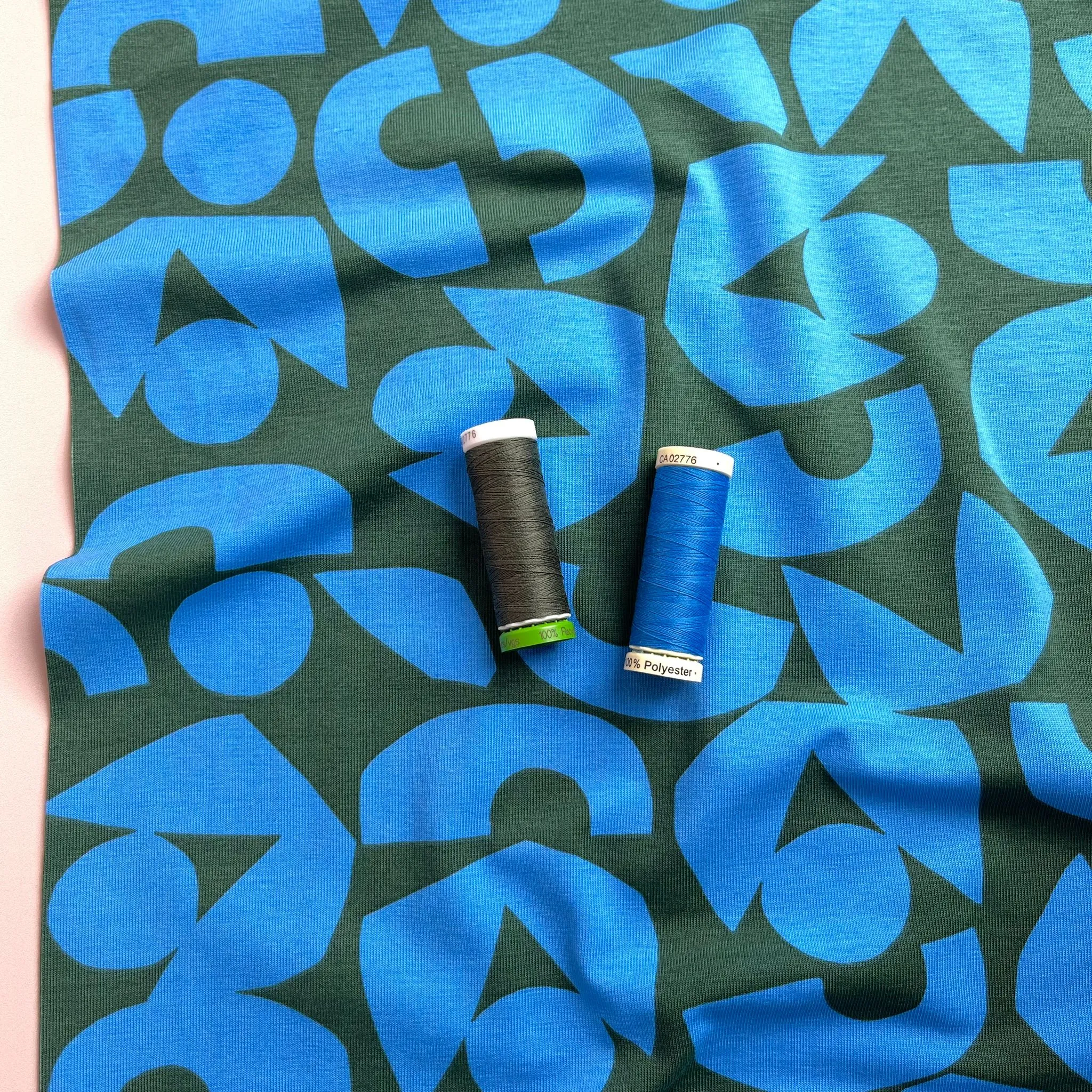 Blue Shapes on Khaki Combed Cotton Jersey Fabric